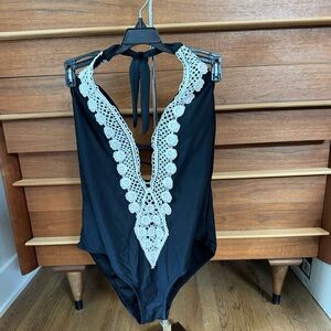 Classy black one piece swimsuit with crochet lace accents